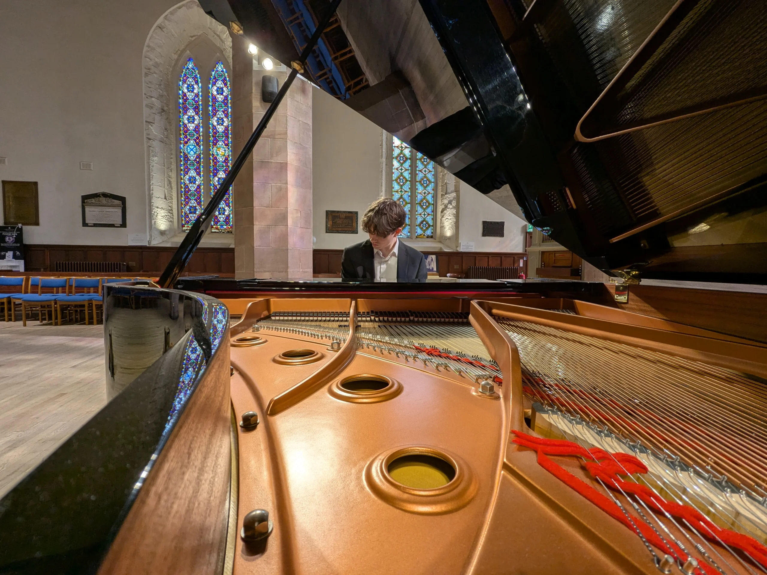 Jazz Pianist at a grand piano.